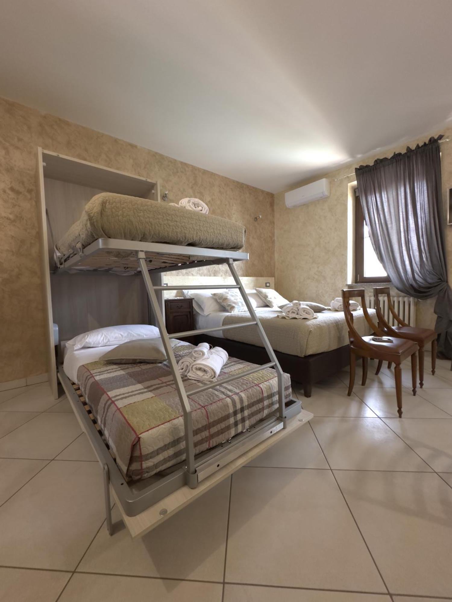 Rocche Di Montexelo - Green Key Apartments & Spa Monticello d'Alba Ruang foto